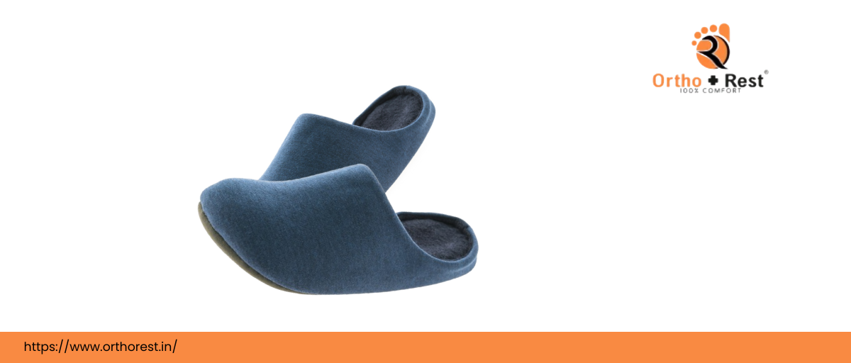 Blue orthopedic house slippers by Ortho Rest on white background.
